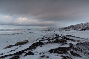 snow covered seashore in Norway