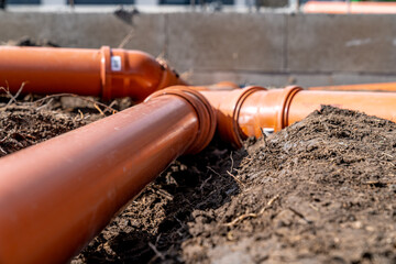 sewage system made of plastic PVC pipes in the ground