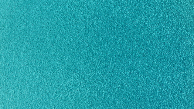 textured turquoise wall background 