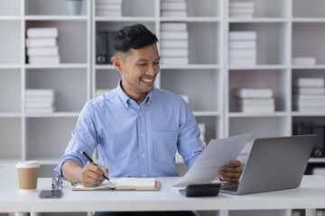 Fototapeta premium Portrait of Asian business man holding coffee cup with work in workplace office Business documents money financial planning concept