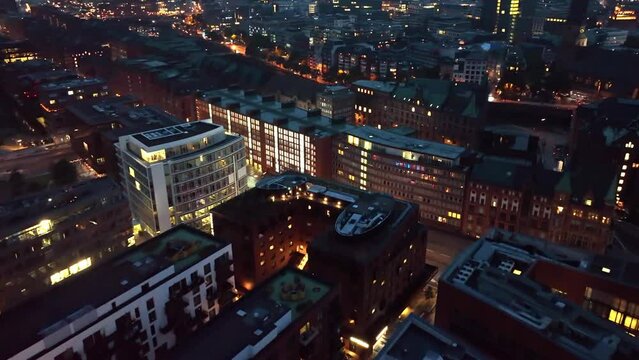 Establishing Aerial Shot of Hamburg at evening , Mecklenburg-West Pomerania, Germany, magic light over the city.