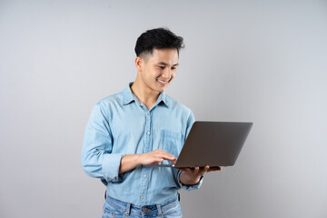 image of young businessman male on gray background