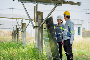 Electrical engineer on solar farm with large structure Check maintain rehearse damaged parts from...