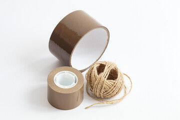 Packing tape with string on a white background - 588826494