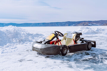 Fototapeta na wymiar Ice karting with sports cars on studded tires. Winter baikal.