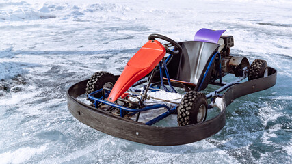 Ice karting with sports cars on studded tires.