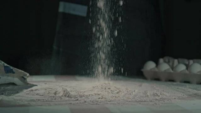 flour fall on the table slow motion homemade baking baker making pastry or bread