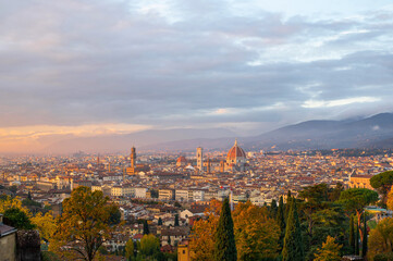 View of Florence Cathedral (Cattedrale di Santa Maria del Fiore) and rest of Florence from Michelangelo plaza at sunset. Panoramic view of Florence, Tuscany, Italy