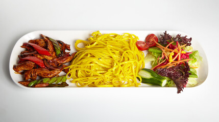 Grilled Chicken with Soy Sauce Linguine Pasta and Green Salad White Background