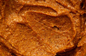 Baby food, vegetable puree close-up. Apple-carrot puree chopped in a blender. Background texture of food for newborn children.