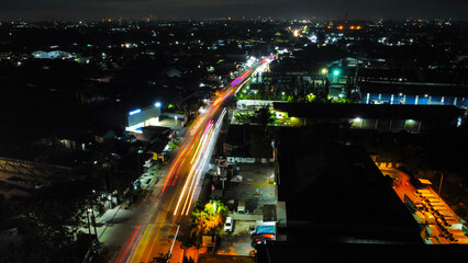 Long exposure Aerial photo of night traffic on the Jakarta Merak highway, Tangerang, Banten, Indonesia