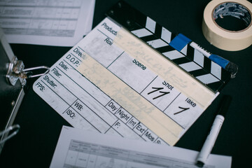 Assistant director with clapperboard on set. Close-up of firecrackers for filming a movie, advertising, TV series.