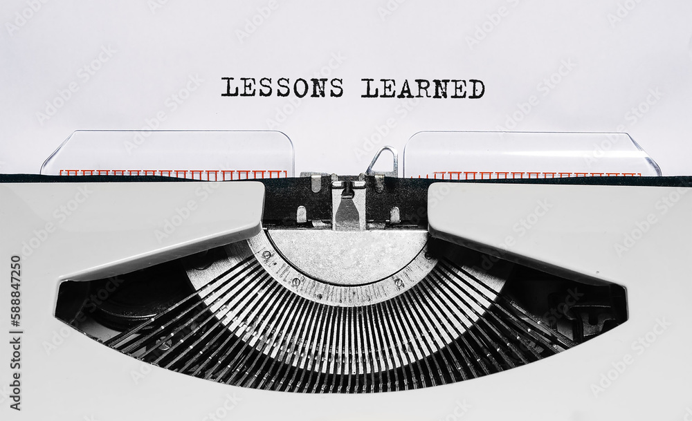 Poster text lessons learned typed on retro typewriter