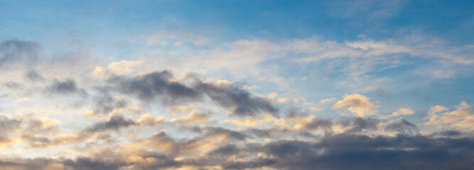 Dark clouds in the blue sky during sunset