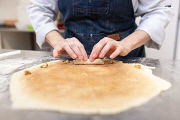 Pastry chef making sweets, rugelach and croasant