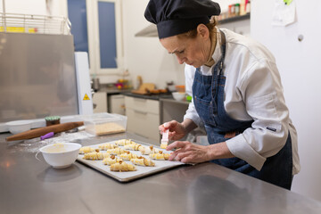 Pastry chef making sweets, rugelach and croasant