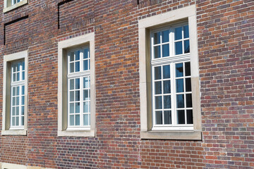 Fototapeta na wymiar old brick building with windows