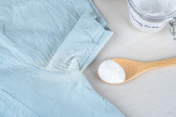 Homemade cleaning sweat stains the armpits on a T-shirt. Homemade green cleaning. Eco-frendly...