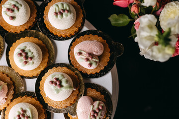 Candy bar at a party. Sweet table with handmade cookies.