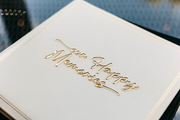 Closeup of a guest book at a wedding.