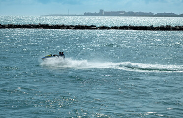 jet skiing in the ocean