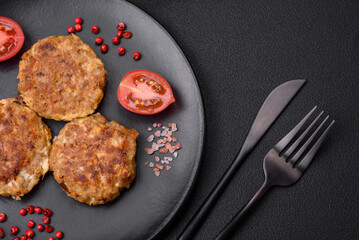 Delicious fresh fried minced fish cutlets with spices and herbs