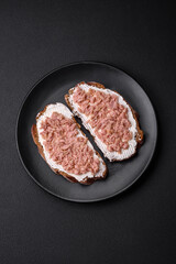 Delicious sandwiches consisting of grilled toast, canned tuna and cream cheese