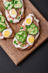 Delicious sandwiches consisting of grilled toast, canned tuna, cream cheese