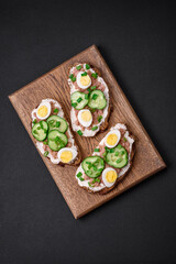 Delicious sandwiches consisting of grilled toast, canned tuna, cream cheese