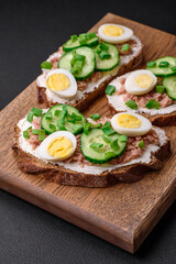 Delicious sandwiches consisting of grilled toast, canned tuna, cream cheese