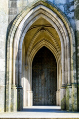 Arches and entrance door of the Chapel dos Pestanas in Oporto, Portugal.