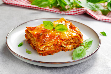 Delicious Homemade Lasagna with Bolognese Sauce on Bright Background, Italian Cuisine, Tasty Baked Lasagna