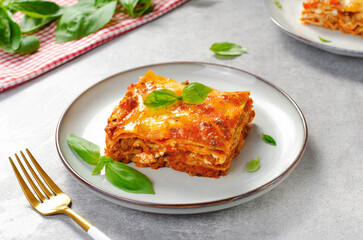 Delicious Homemade Lasagna with Bolognese Sauce on Bright Background, Italian Cuisine, Tasty Baked Lasagna