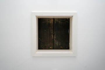 Close up of a loft hatch in a ceiling