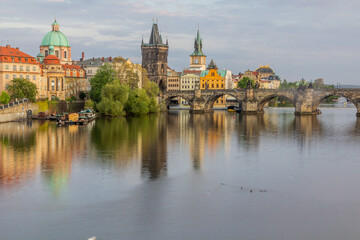 Fototapeta premium Skyline of the Old Town in Prague with the Charles Bridge, Czech Republic