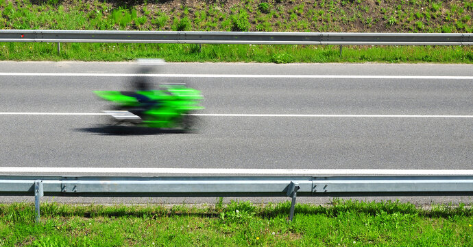 Speed motorcycle motorbiker drive on the road 