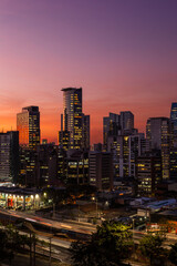 Fototapeta na wymiar Vista do pôr do sol com os Edifício dos bairros da Vila Olimpia e Itaim Bibi, São Paulo, Brasil