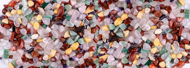 Colorful stones mix texture background, pebbles pattern