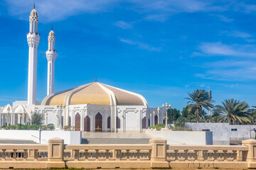 Hassan Enany golden domed mosque with palms in foreground, Jeddah, Saudi Arabia