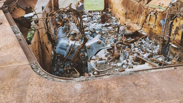 Russian tank or bmp destroyed by the Ukrainian military during the invasion of Ukraine. The remains of a blown up Russian tank in the Kherson region, Ukraine . The tank is covered with rust