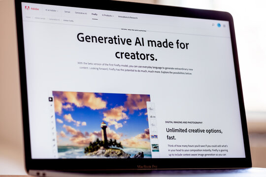 ITALY - April 4, 2023: Adobe Firefly website displayed on mac laptop screen. Adobe has announced the beta release of its AI Art Generator tool.