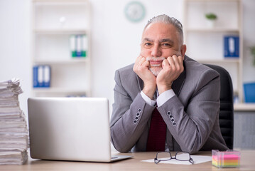 Old male employee and too much work in the office