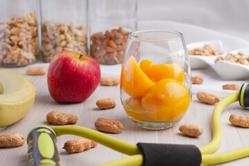 healthy breakfast, peaches, banana,  cashew nuts and almonds