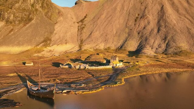 Aerial view of a Viking village along the lake in Austurland, Iceland.