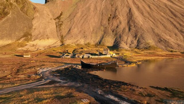 Aerial view of a Viking village along the lake in Austurland, Iceland.