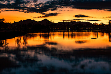 Sunset reflected on the tranquil lake in Arizona