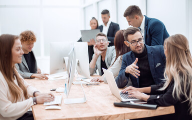 business colleagues discussing work issues in the workplace.