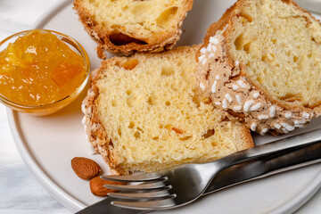 Italian Easter colomba cake with almonds and candied fruits and Easter eggs  and holiday decorations easter bunny