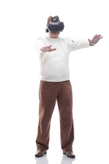 adult male looking with interest through virtual reality glasses