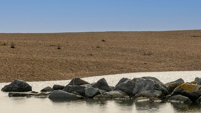 Rock pool on a pebble beach